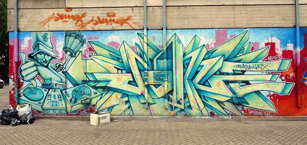 Graffiti-Piece mit B-Boy-Charakter in Genf